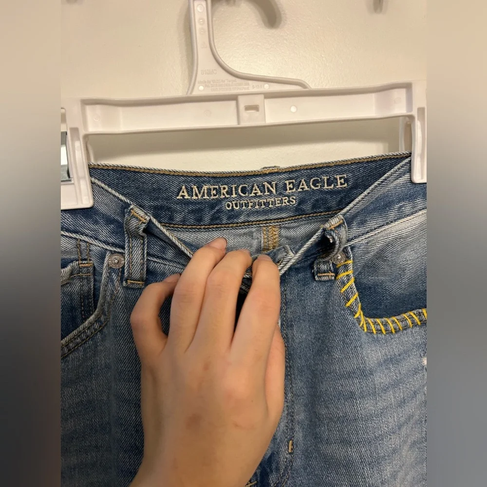 American Eagle University of Iowa Embroidered High-Waisted Jeans - Picture 9 of 14